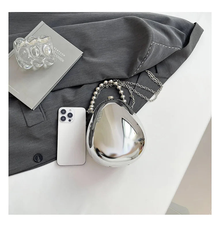 New acrylic eggshell bag 2025 fashion niche design women's messenger bag portable dinner bag