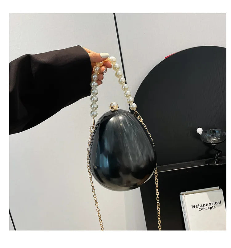 New acrylic eggshell bag 2025 fashion niche design women's messenger bag portable dinner bag