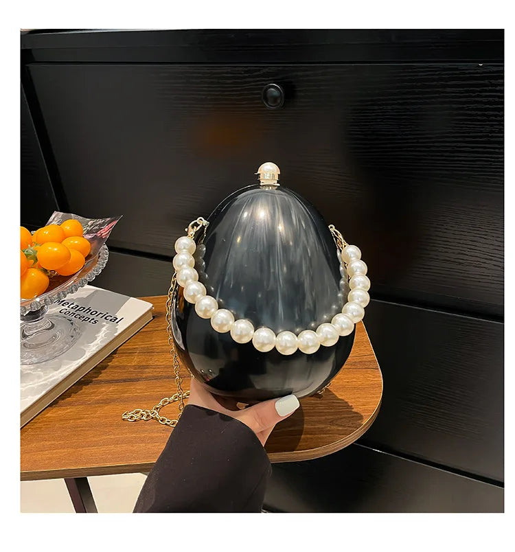New acrylic eggshell bag 2025 fashion niche design women's messenger bag portable dinner bag
