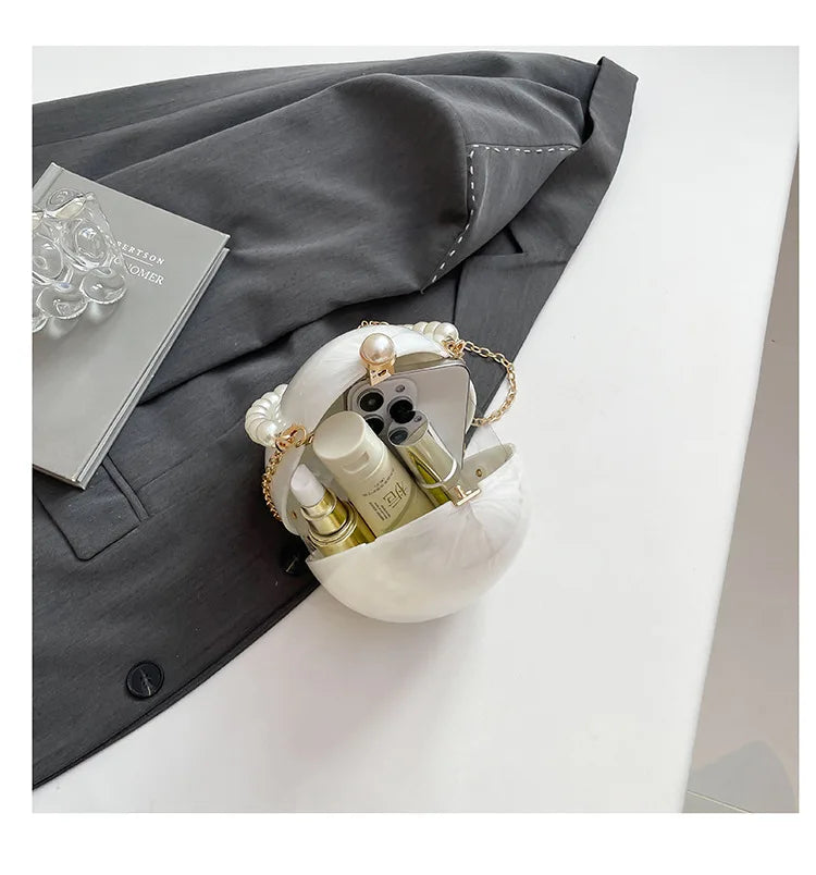 New acrylic eggshell bag 2025 fashion niche design women's messenger bag portable dinner bag