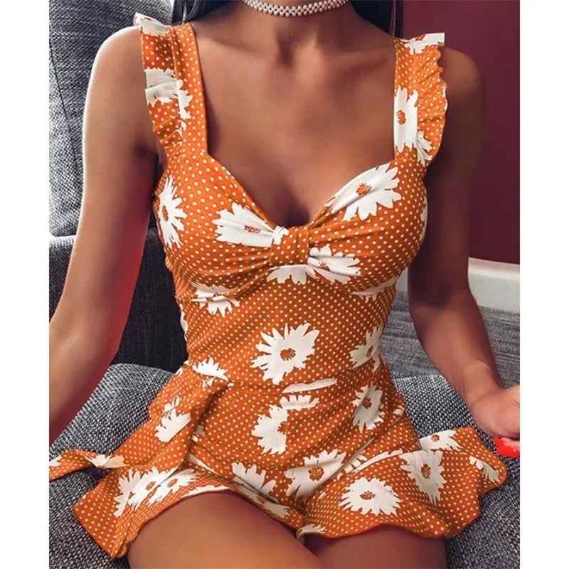 Breezy Sleeveless Dress with Vibrant Floral Print and Elegant V-Neck ﻿