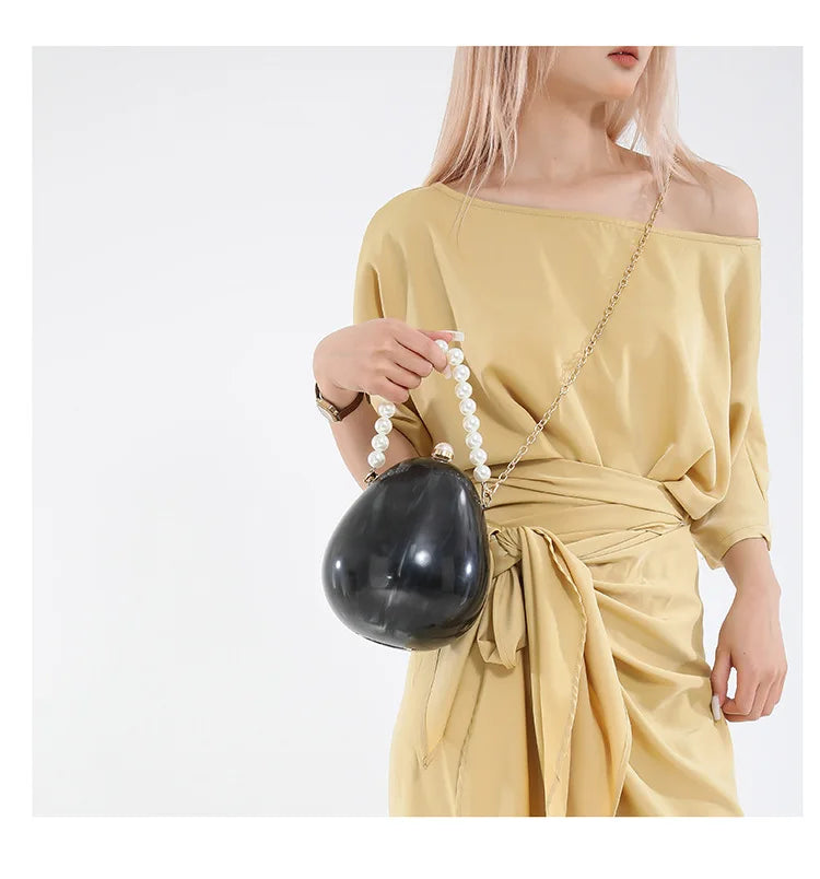 New acrylic eggshell bag 2025 fashion niche design women's messenger bag portable dinner bag