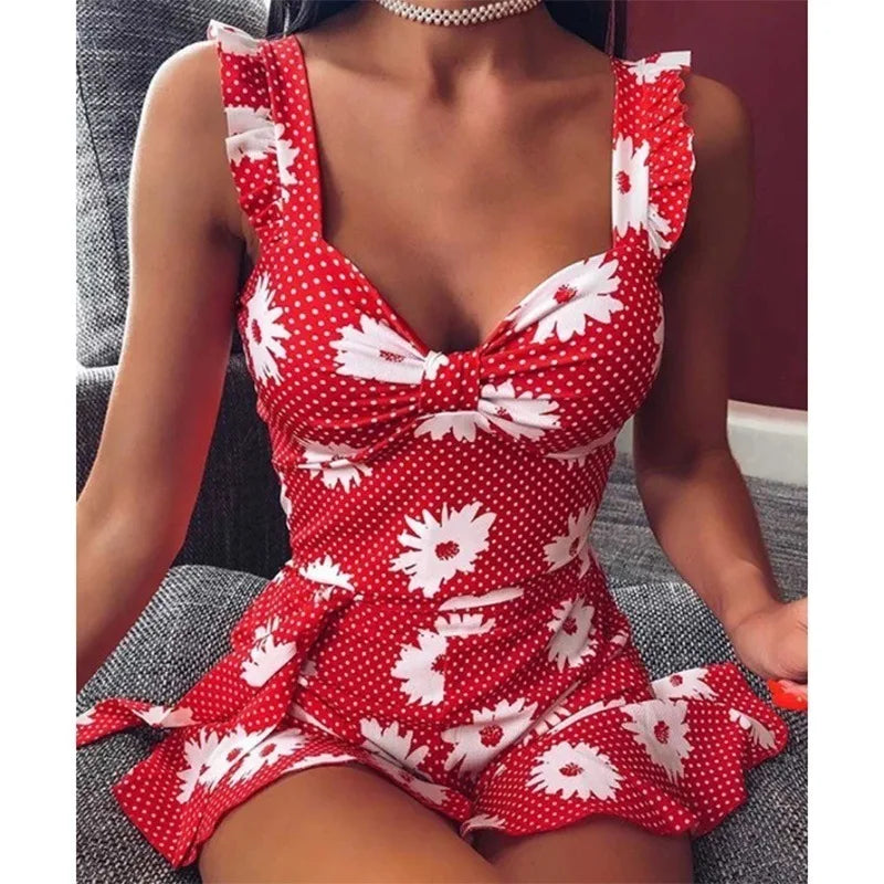 Breezy Sleeveless Dress with Vibrant Floral Print and Elegant V-Neck ﻿